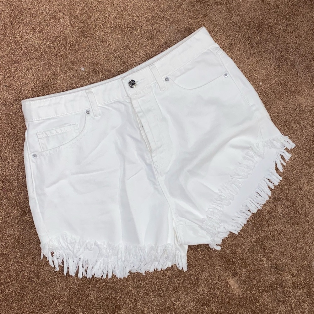 White fringed shorts